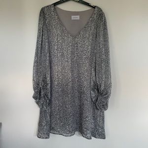 Adrienne ballon sleeve animal print dress.